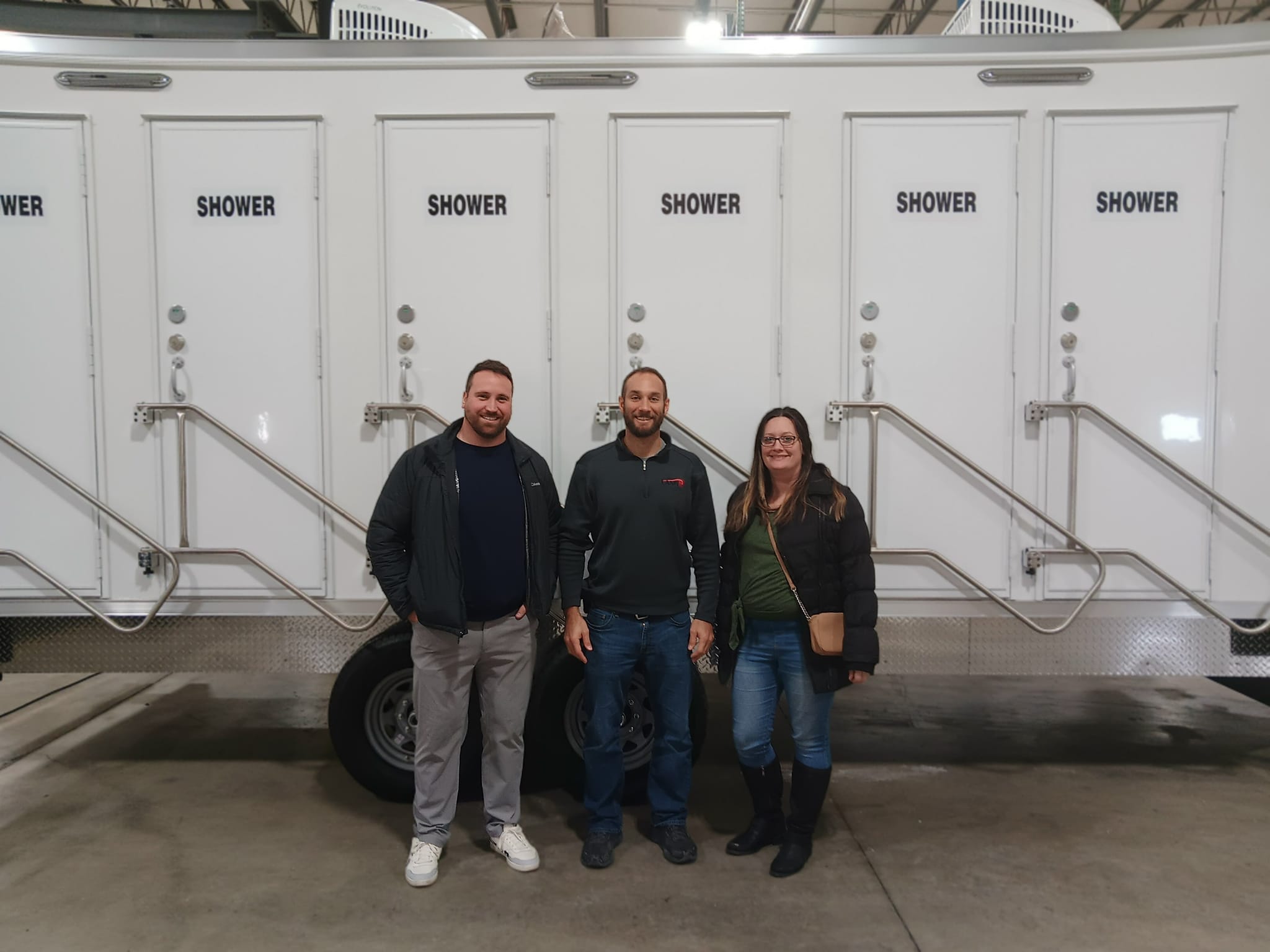 Tony, Adam, and Sabrina picking up the Shower trailer