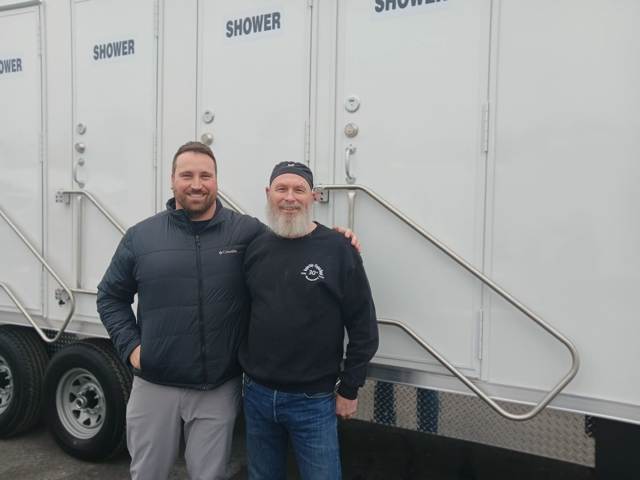 Tony and David with thee shower trailer
